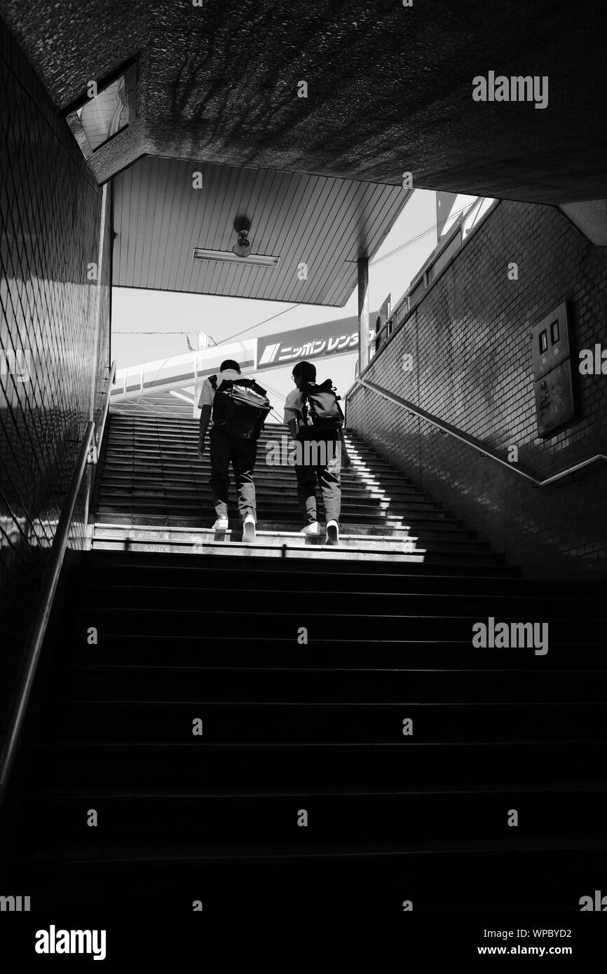 Backpack stairs Black and White Stock Photos & Images - Alamy