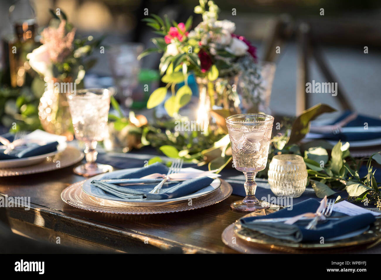 Vintage Table Setup For Outdoor Wedding Reception Stock Photo