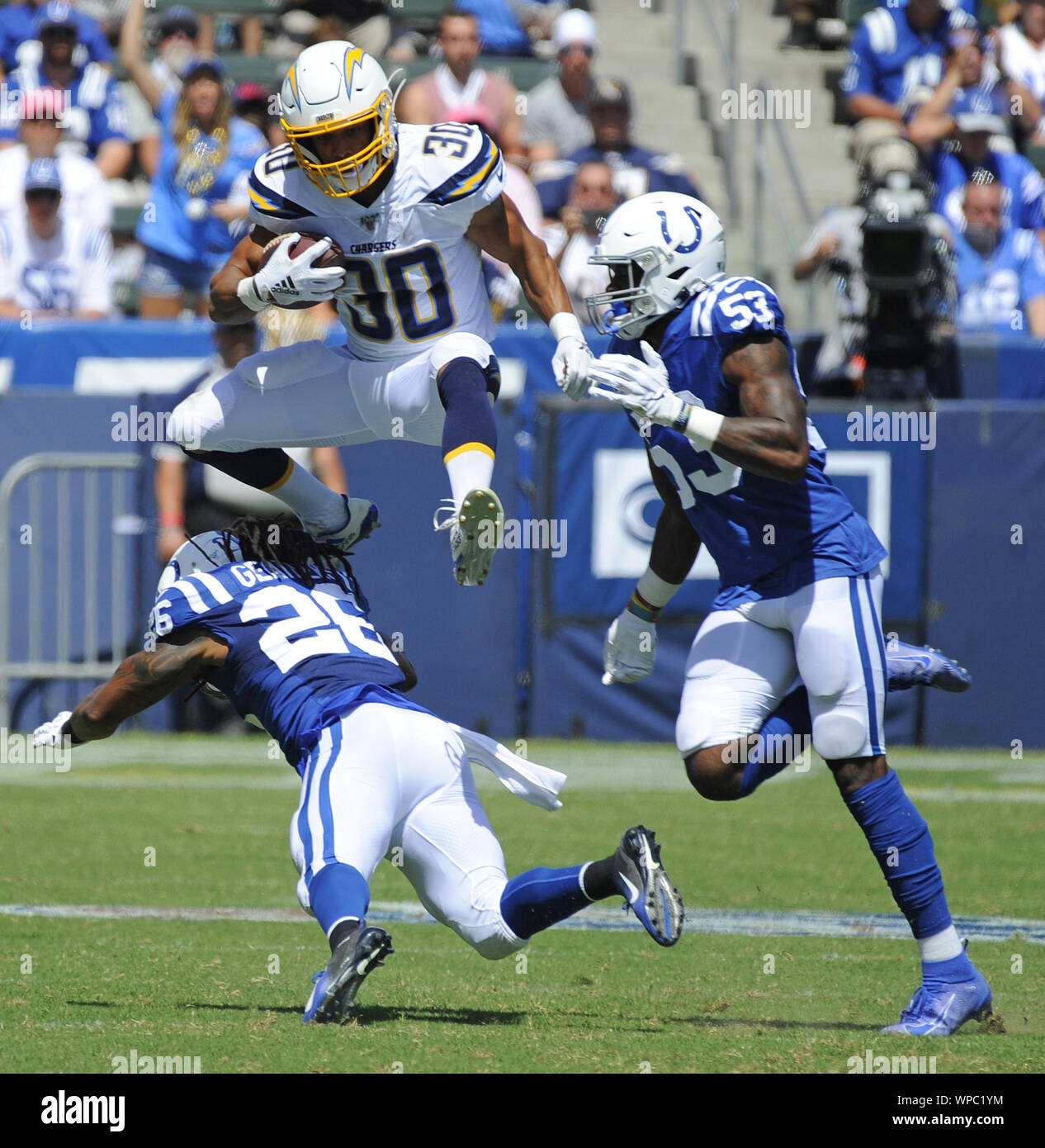 Los Angeles Chargers' Austin Ekeler avoids being tackled by Indianapolis Colts' Clayton Geathers in the first half at Dignity Health Sports Park in Carson, California on September 8, 2019. Photo by Lori Shepler/UPI Stock Photo