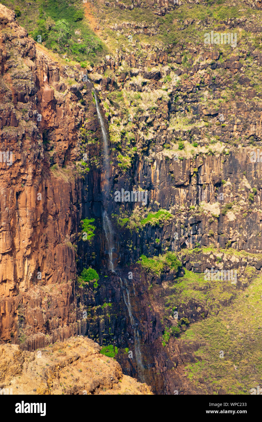 Overlooking Waimea Falls in Waimea Canyon State Park on the island of Kauai, Hawaii, USA, nicknamed the Grand Canyon of the Pacific. Stock Photo