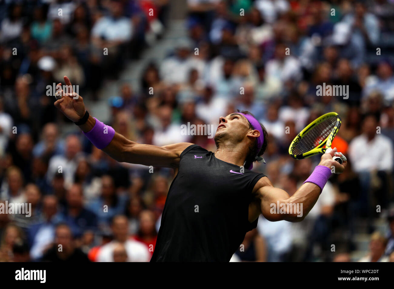 Flushing Meadows, New York, United States - September 8, 2019. Rafael Nadal of Spain serving against Daniil Medvedev in the men's final at the US Open today. Credit: Adam Stoltman/Alamy Live News Stock Photo