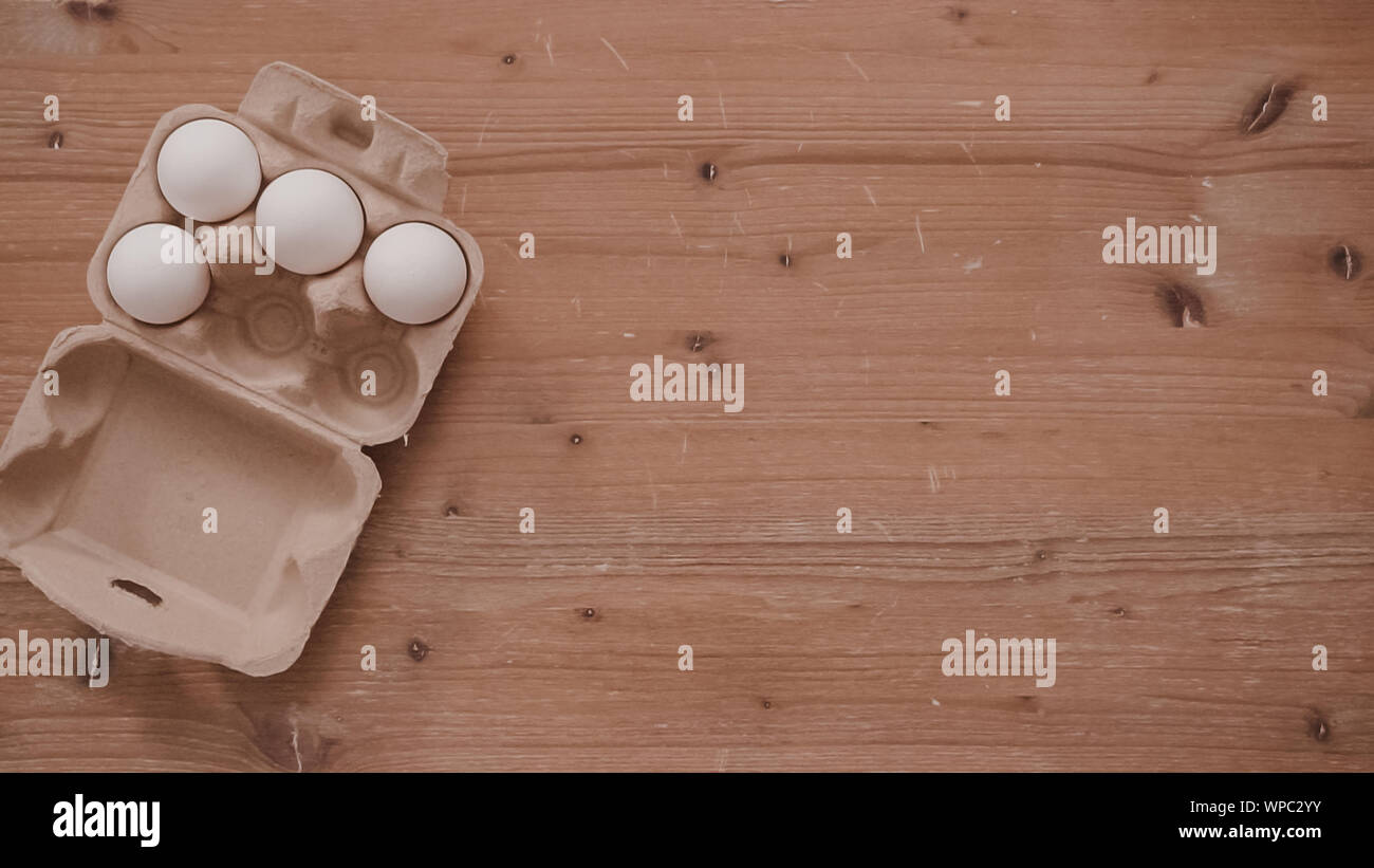 Flat lay. Step by step. white flour in a paper egg crate Stock Photo