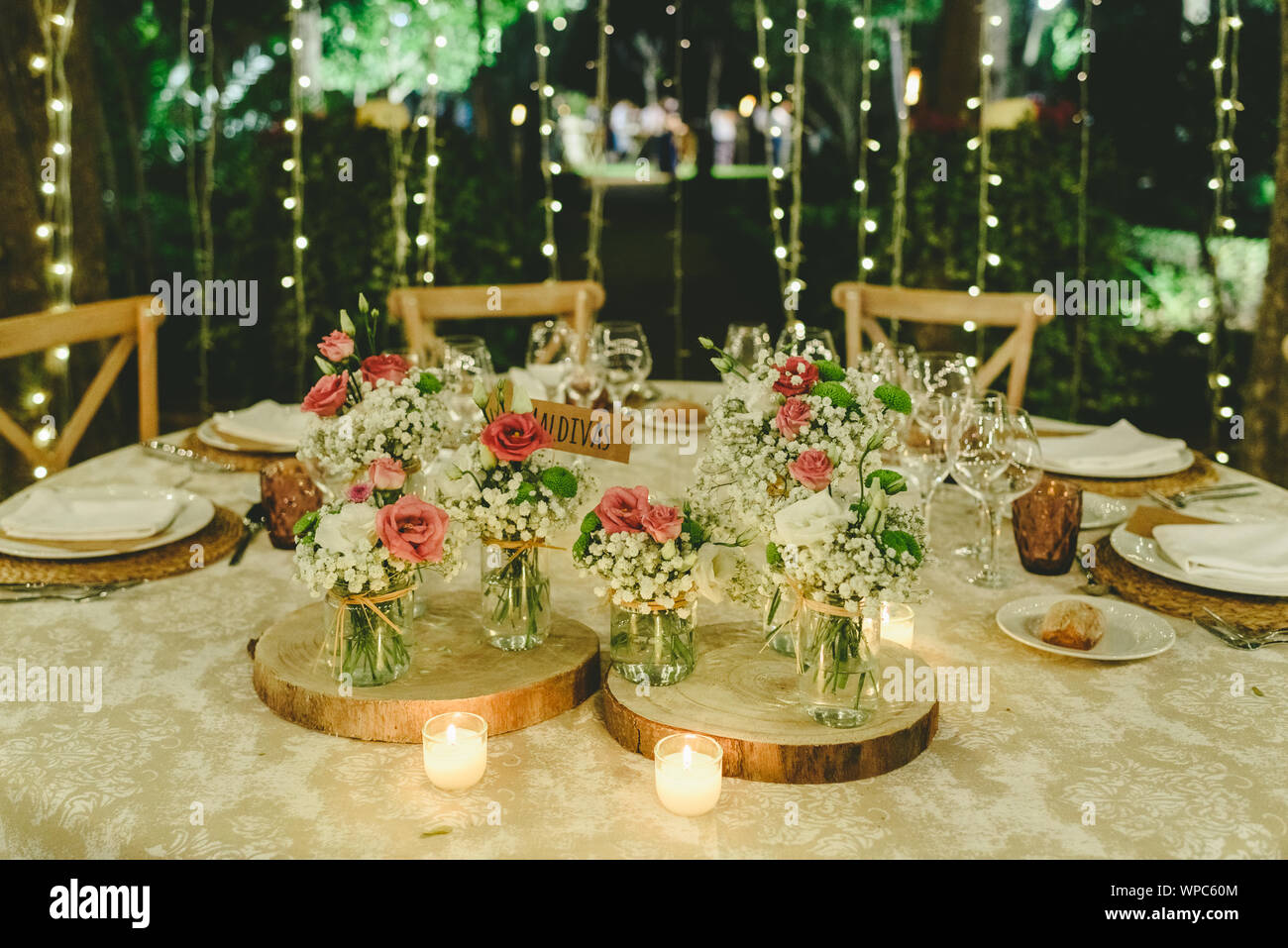 Outdoor Tables For An Elegantly Decorated Wedding Reception With