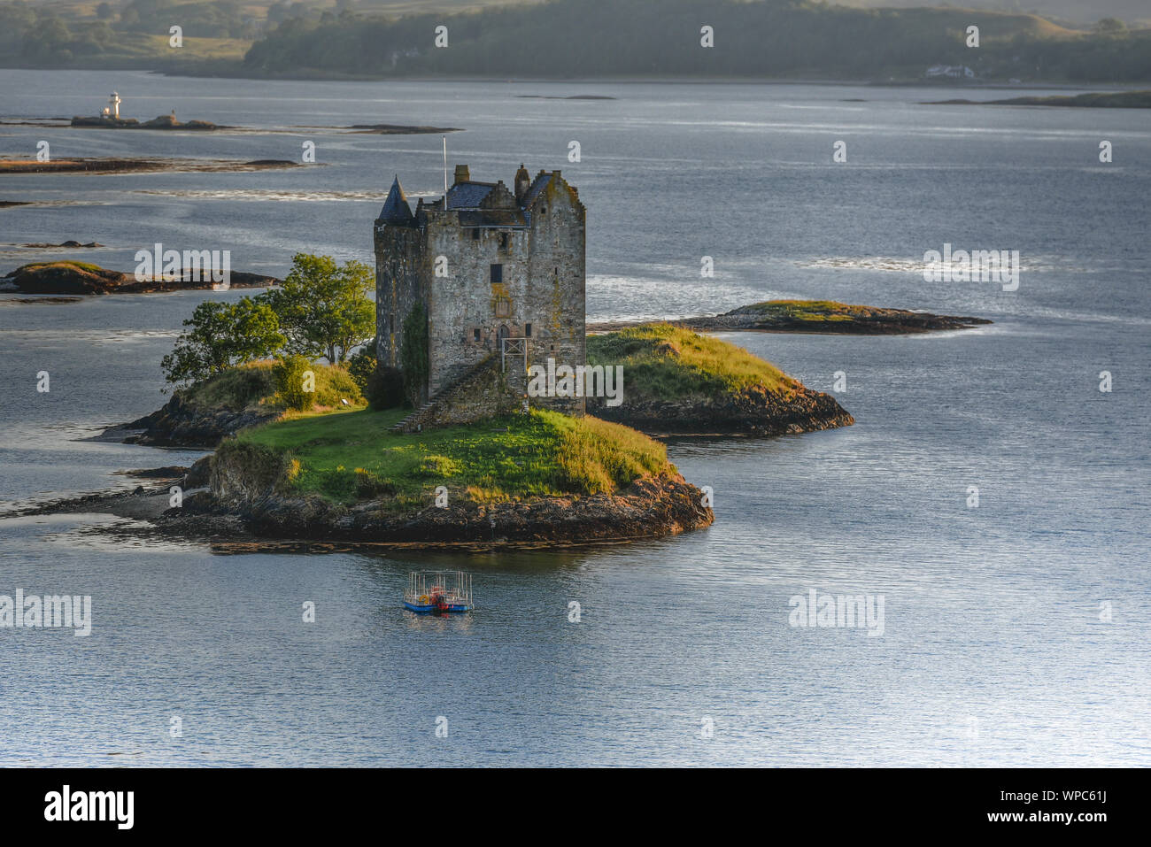 Tower on island in lake in north-west Scotland Stock Photo