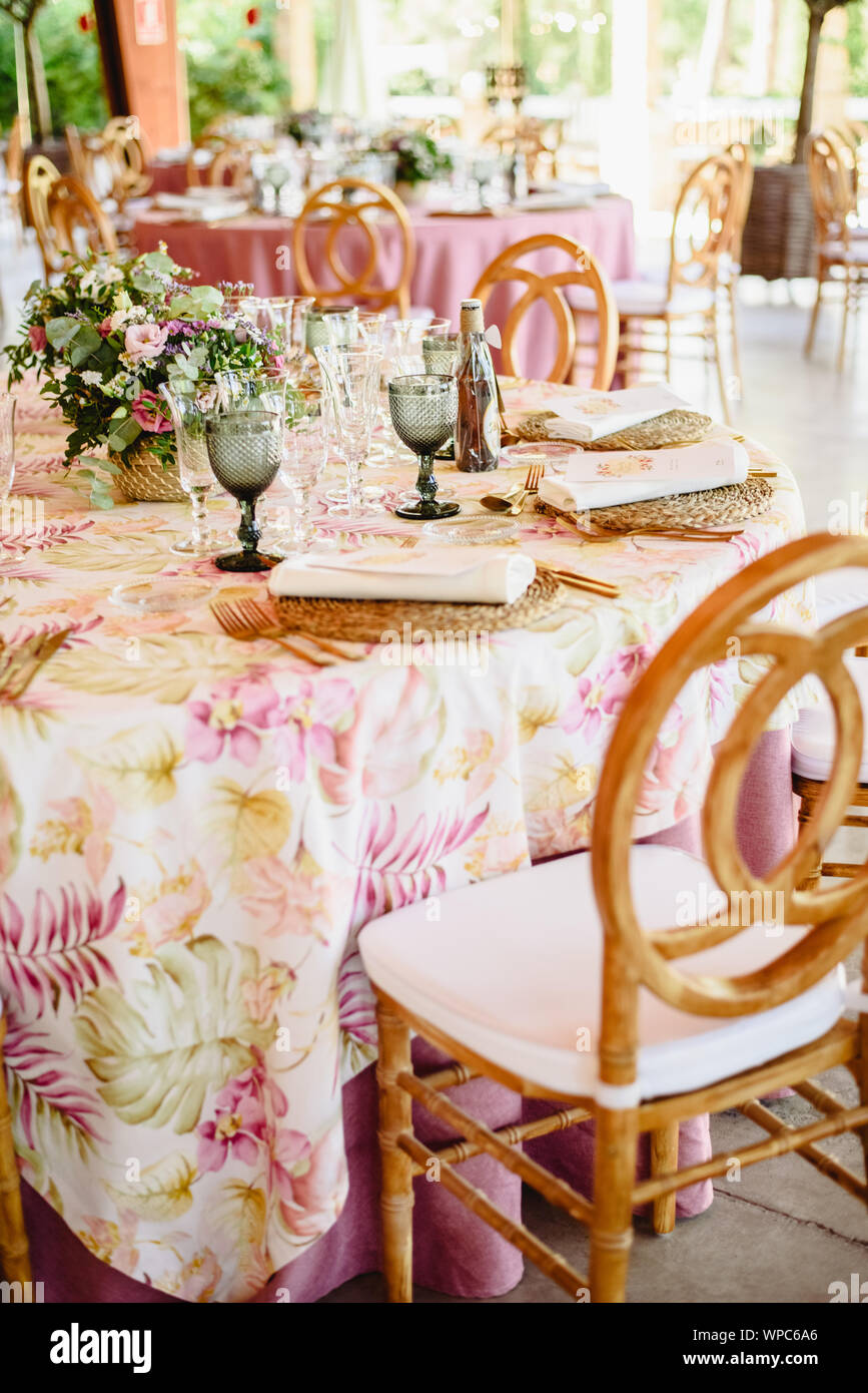 Elegant cutlery and floral arrangements for a table in a wedding