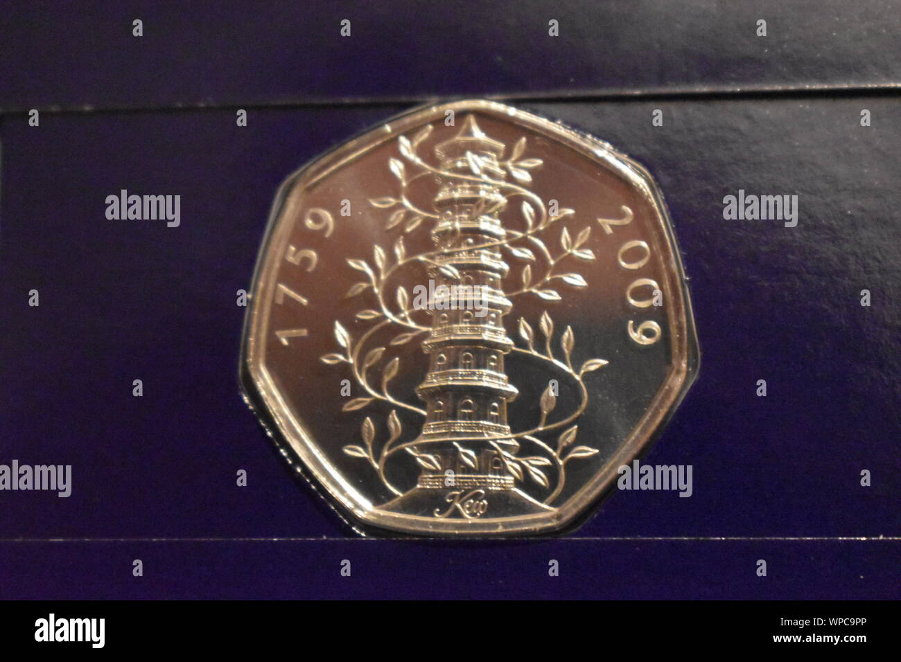 Kew Gardens 50p. This is a genuine 2019 reissue uncirculated 50p with a brilliant finish quality with a dark navy background in a protective case. Stock Photo