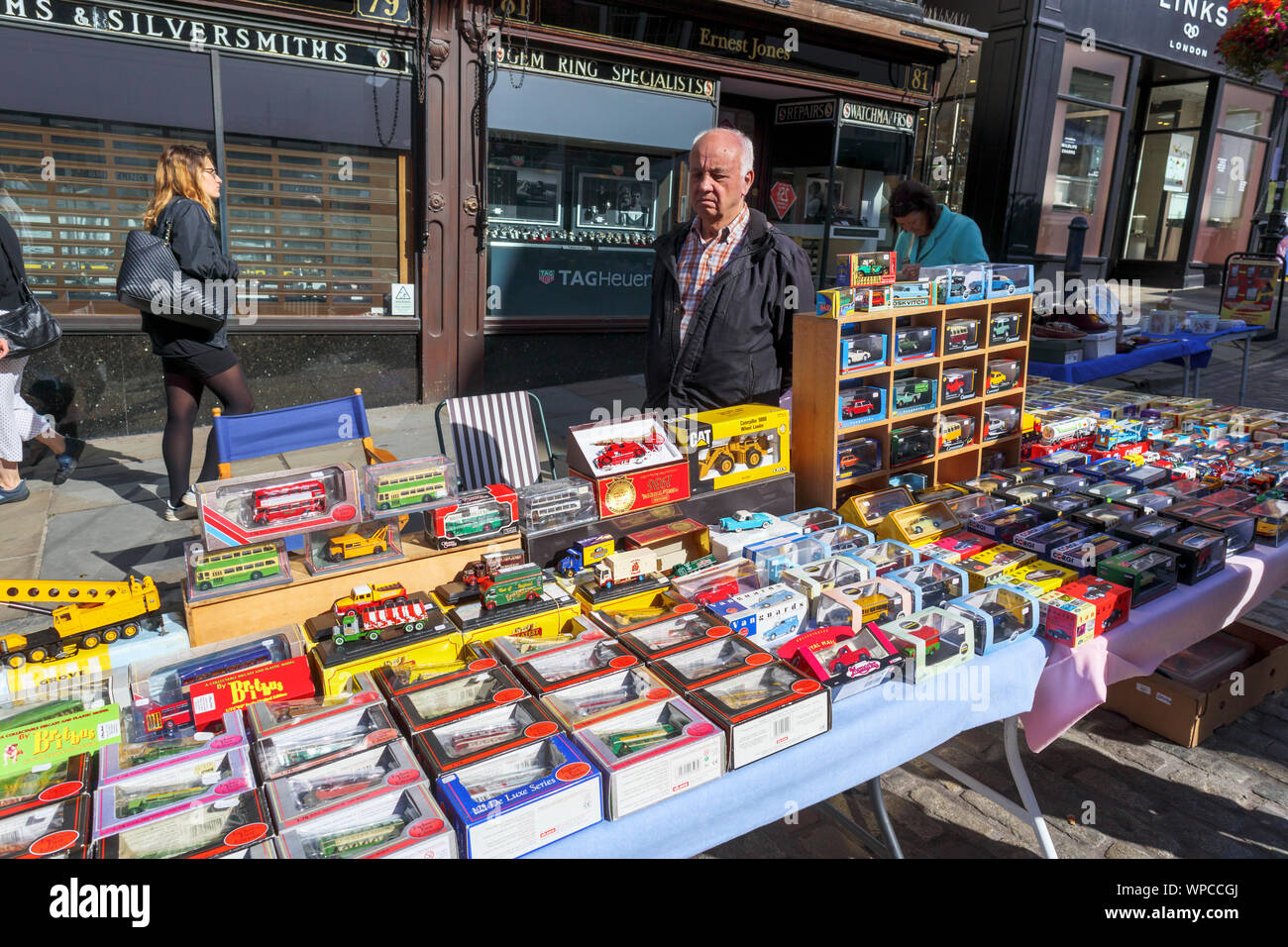 A stall selling collectible vintage toy vehicles on Guildford Antique