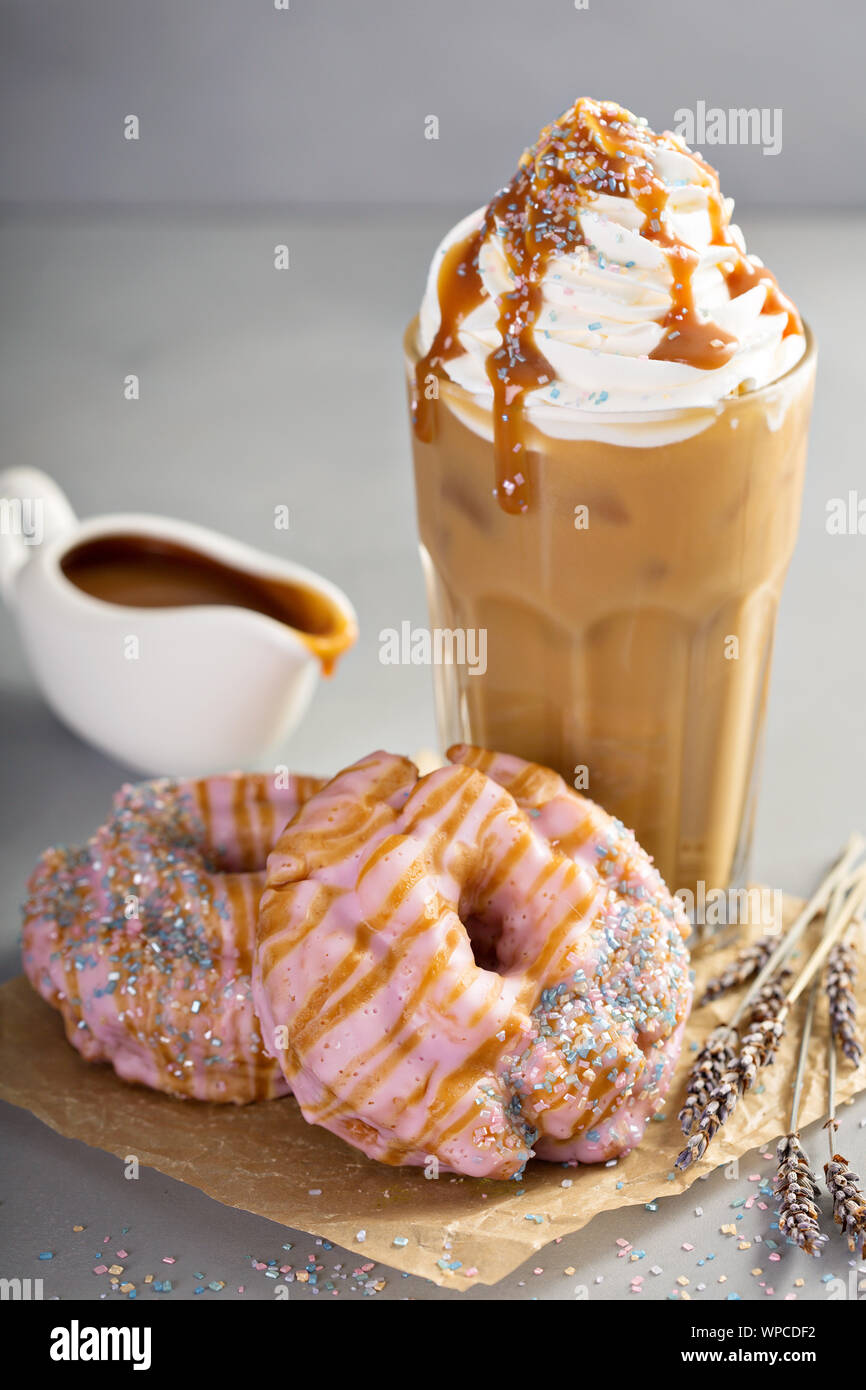 Lavender caramel donuts with iced coffee Stock Photo Alamy