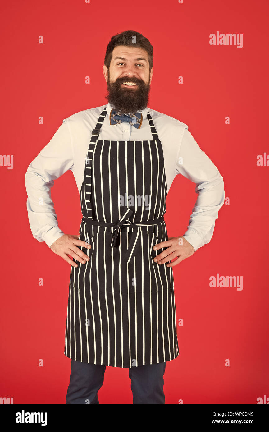 I will cook for you. Bearded man cook smiling in apron. Confident ...