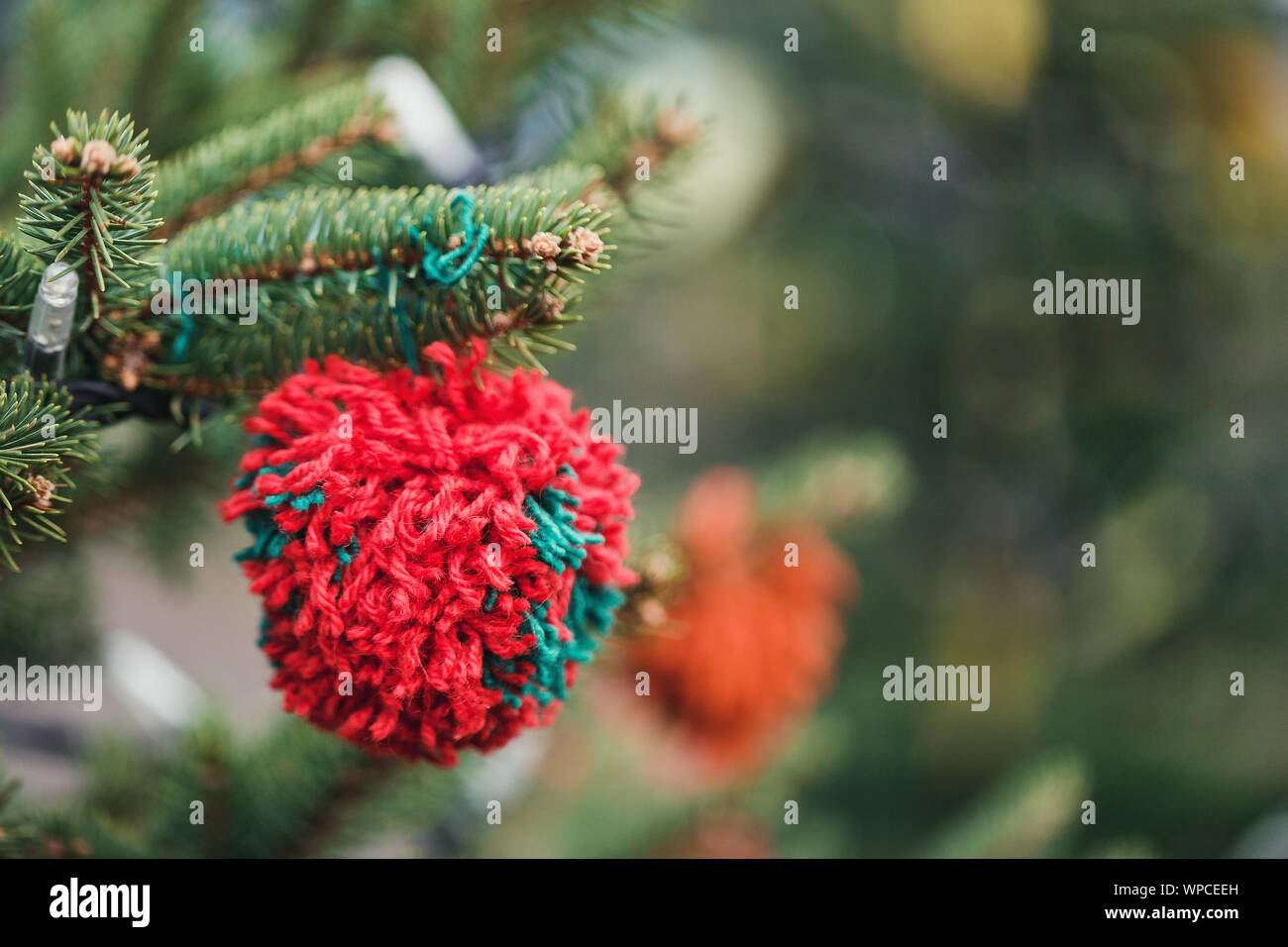 Download Wool Handmade Decoration On A Christmas Tree Outdoor Diy Yarn Crafts Creative Ideas For Children Environment Recycle And Zero Waste Concept Select Stock Photo Alamy Yellowimages Mockups