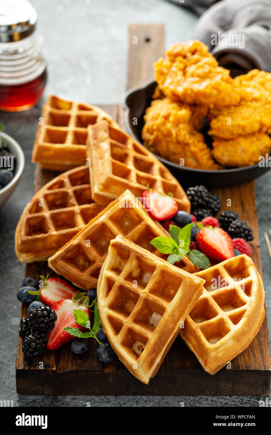 Breakfast platter with waffles, berries and chicken Stock Photo Alamy