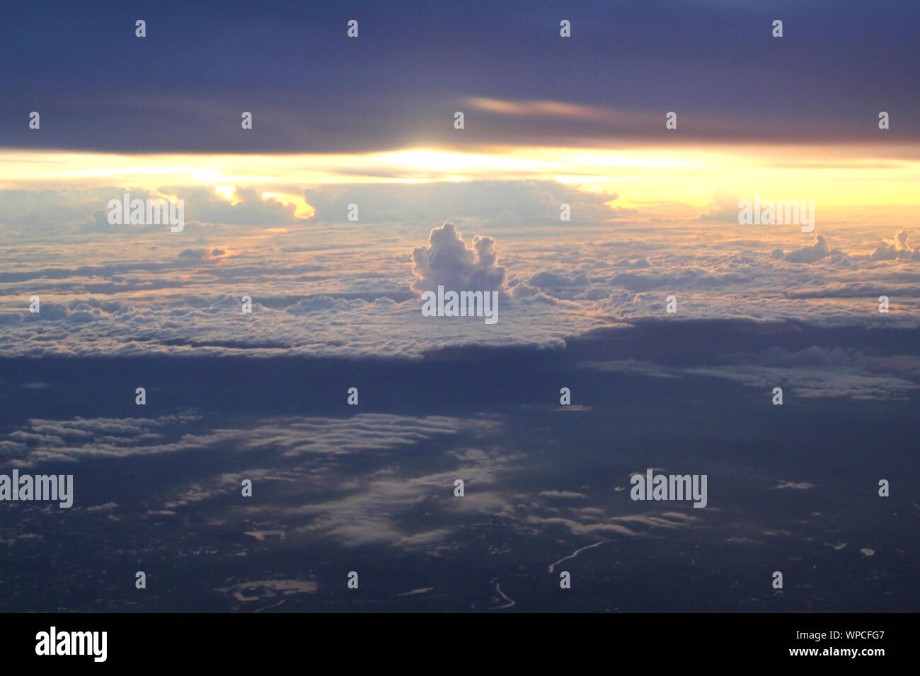 beautiful sunrise view from the window of an airplane Stock Photo