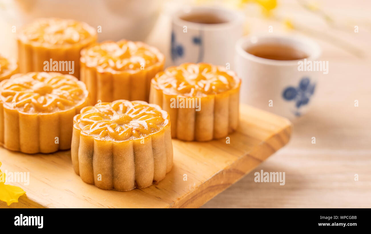 Mid Autumn Festival Holiday Concept Design Of Moon Cake Mooncakes Tea Set On Bright Wooden Table And Serving Plate With Copy Space Close Up Stock Photo 271954239 Alamy