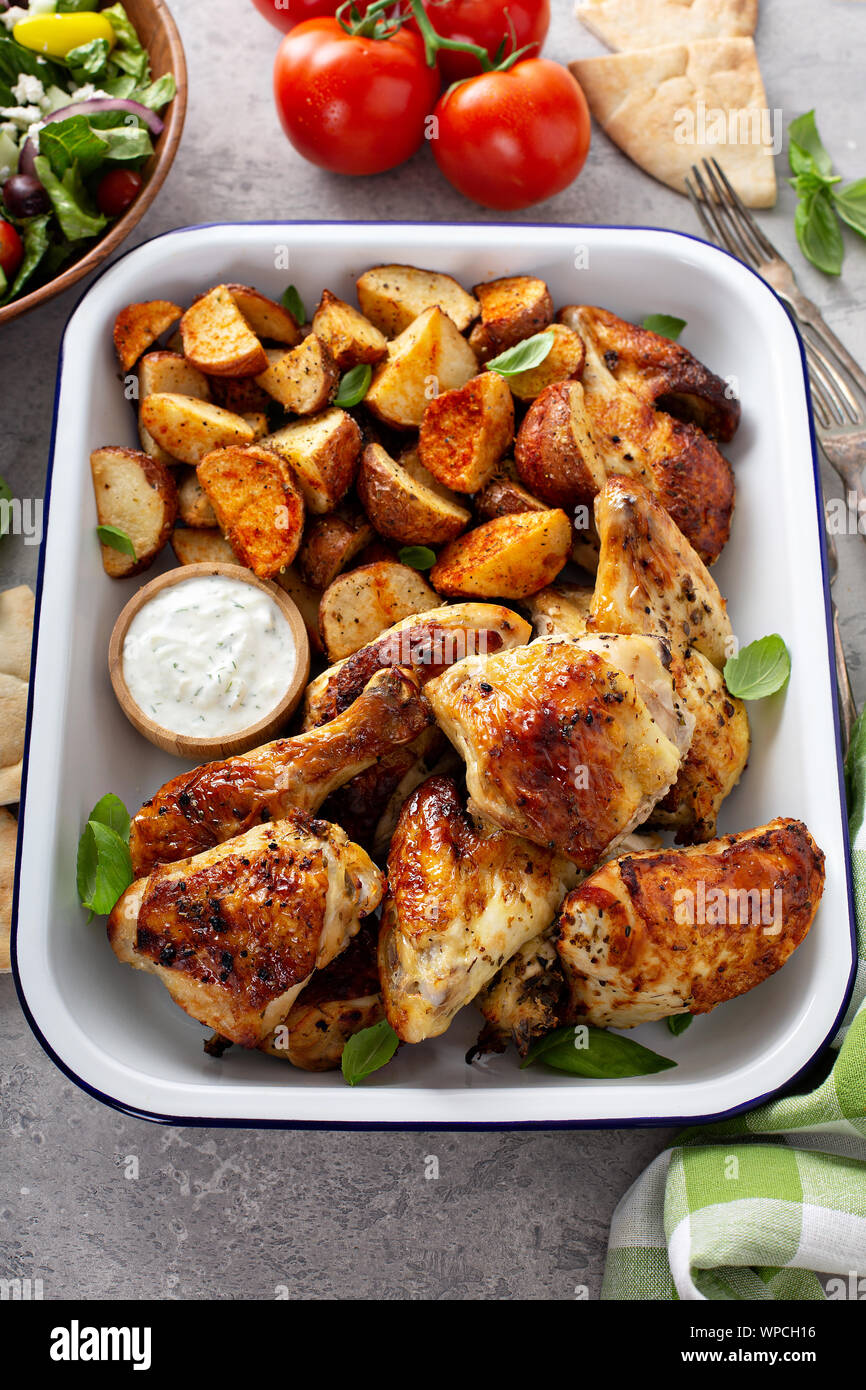 Roasted chicken and potatoes Stock Photo - Alamy