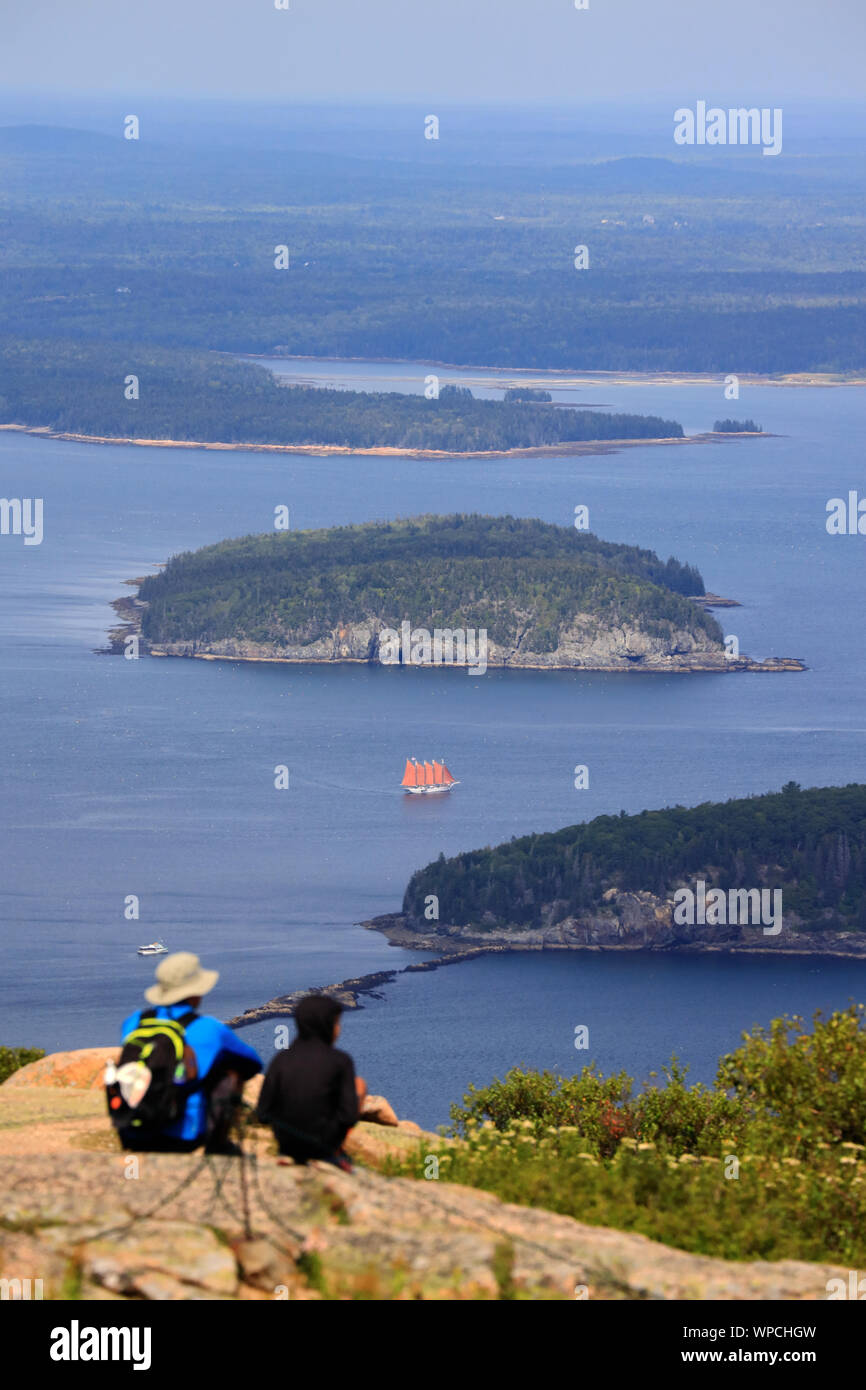 Visitors on top of Cadillac Mountain with Frenchman's Bay and Porcupine