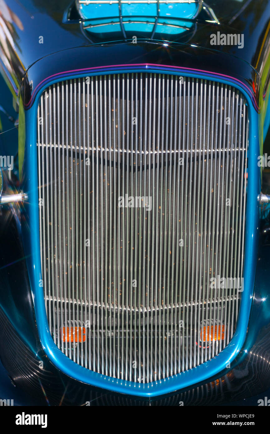 During a custom hot rod & antique car show this vehicle was one of the many on display that the people were able to see and ask owners' any questions. Stock Photo