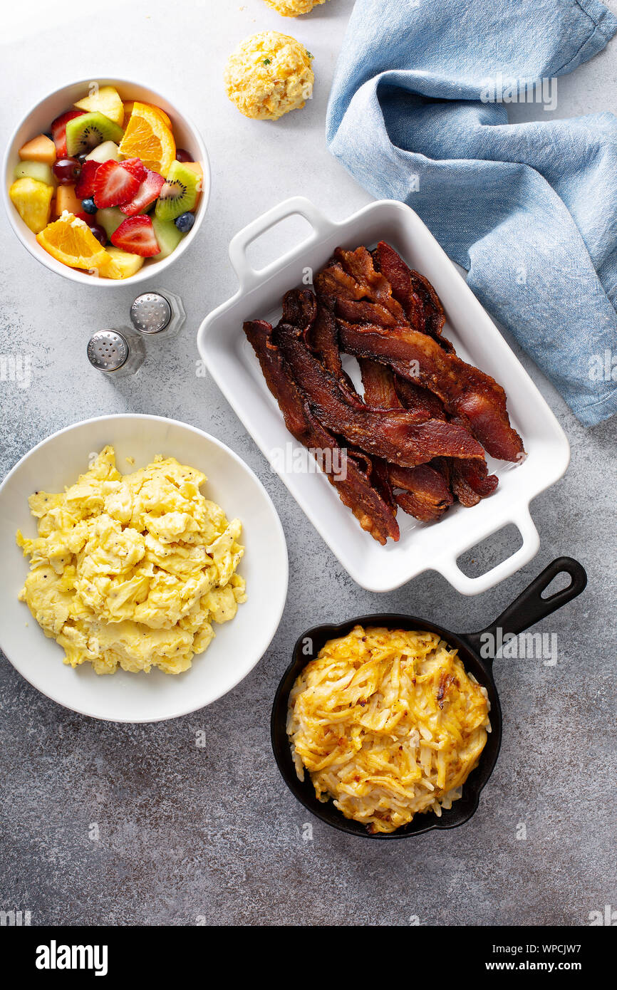 Full breakfast with scrambled eggs, bacon and potatoes Stock Photo Alamy