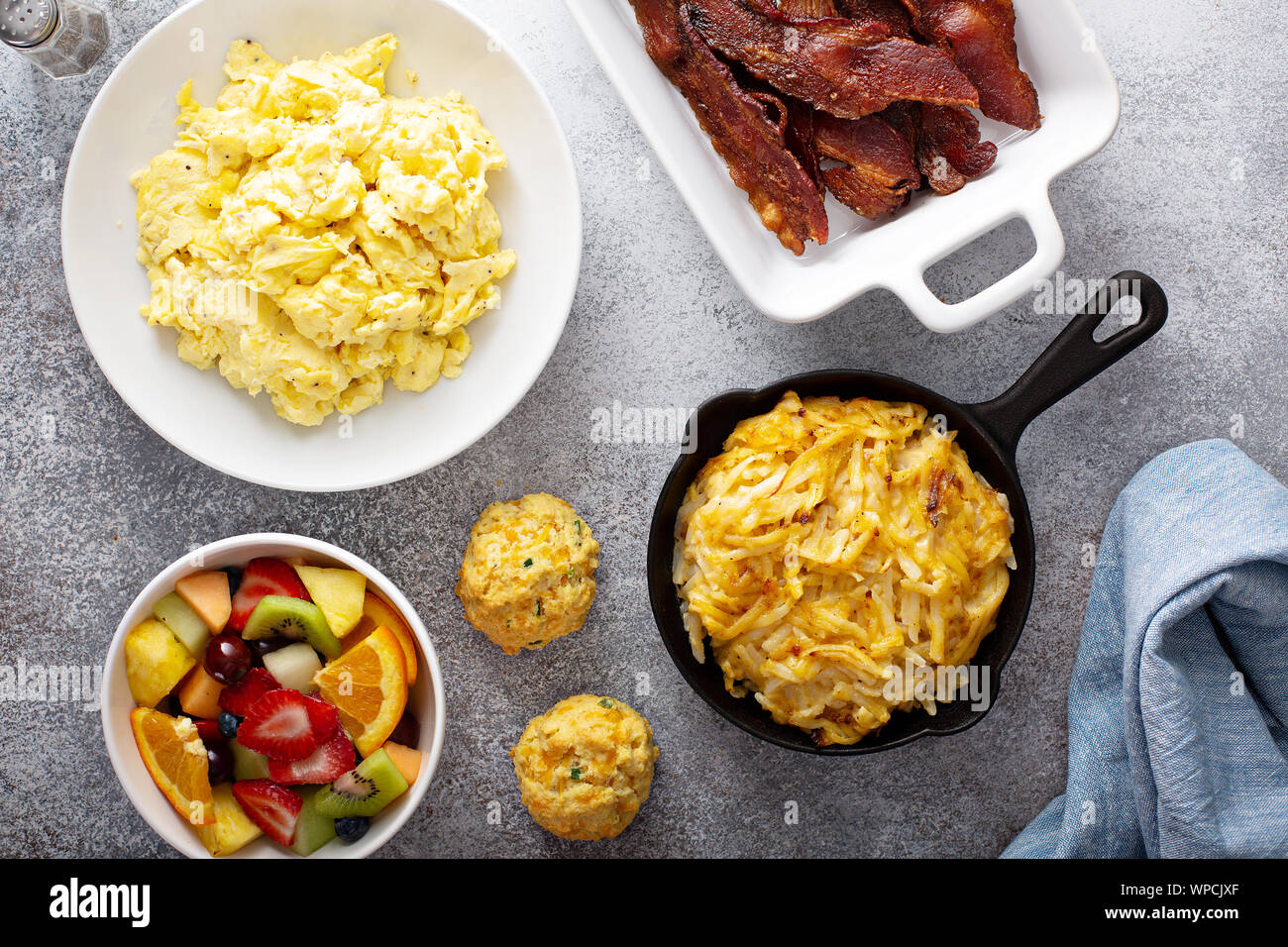 Full breakfast with scrambled eggs, bacon and potatoes Stock Photo Alamy