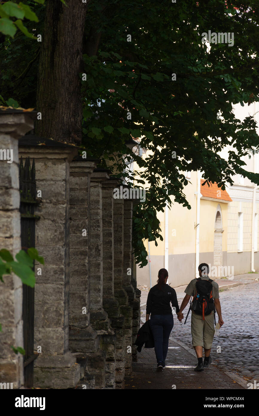 Old couple walking hand in hand hi-res stock photography and images - Alamy