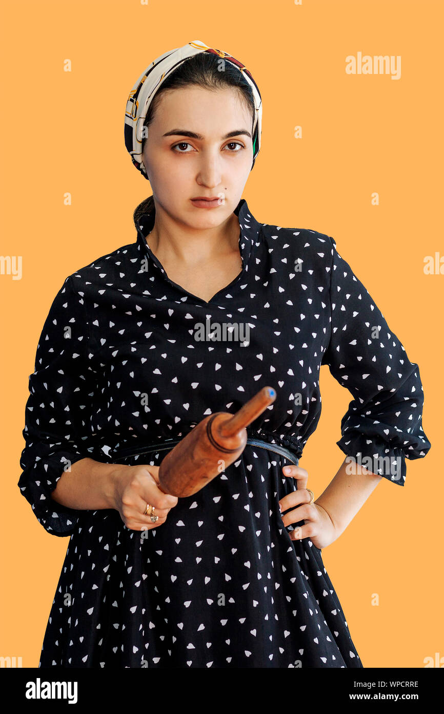 Angry wife waiting for her husband. Aggressive young middleeastern