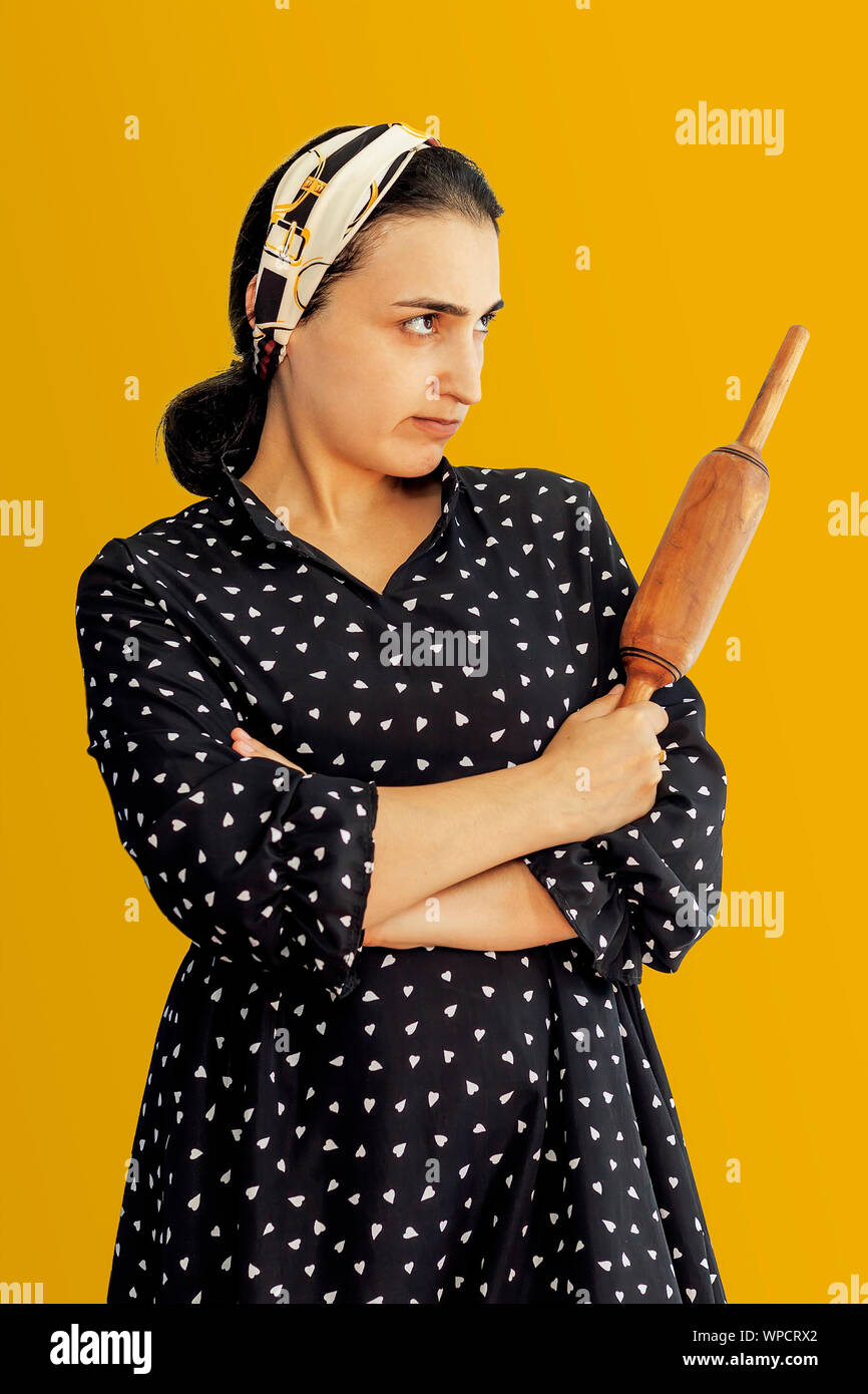 Angry wife waiting for her husband. Aggressive young middleeastern