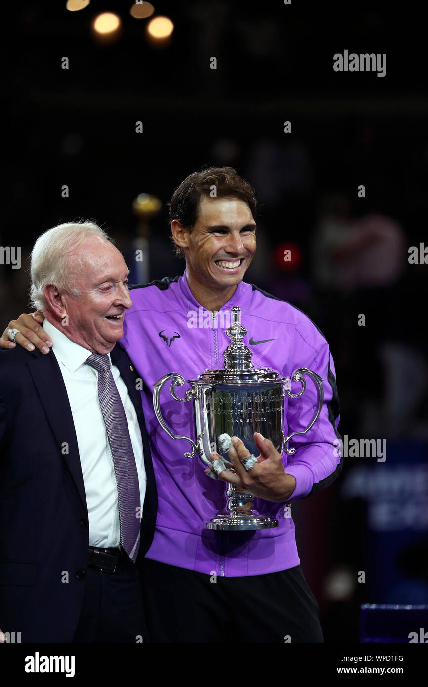 New York, United States. 08th Sep, 2019. Flushing Meadows, New York, United States - September 8, 2019. Rafael Nadal of Spain shares a laugh with Rod Laver after being presented with the US Open trophy following Nadal's victory over Daniil Medvedev in the men's final today. Credit: Adam Stoltman/Alamy Live News Stock Photo