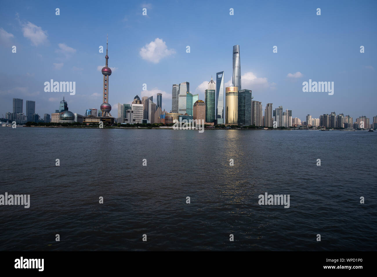 Shanghai, China. 08th Sep, 2019. View from the promenade "The Bund" at the Huangpu river to the skyline of the special economic zone Pudong with its skyscrapers. On the left you can see the Oriental Pearl Tower and on the right the Shanghai Tower. Credit: Swen Pförtner/dpa/Alamy Live News Stock Photo