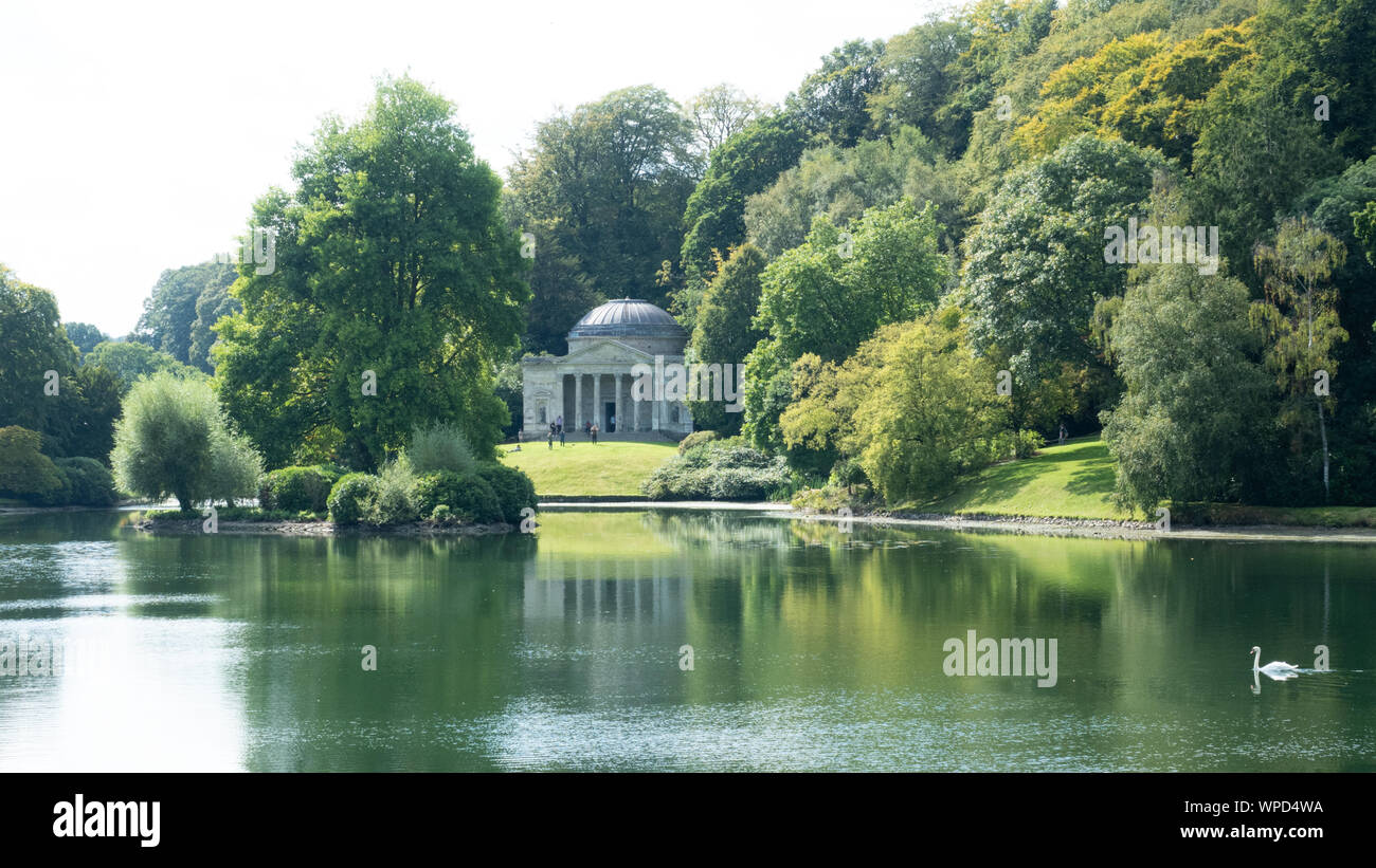 Stourhead landscape gardens late summer afternoon. The Pantheon seen from across the lake. Stock Photo