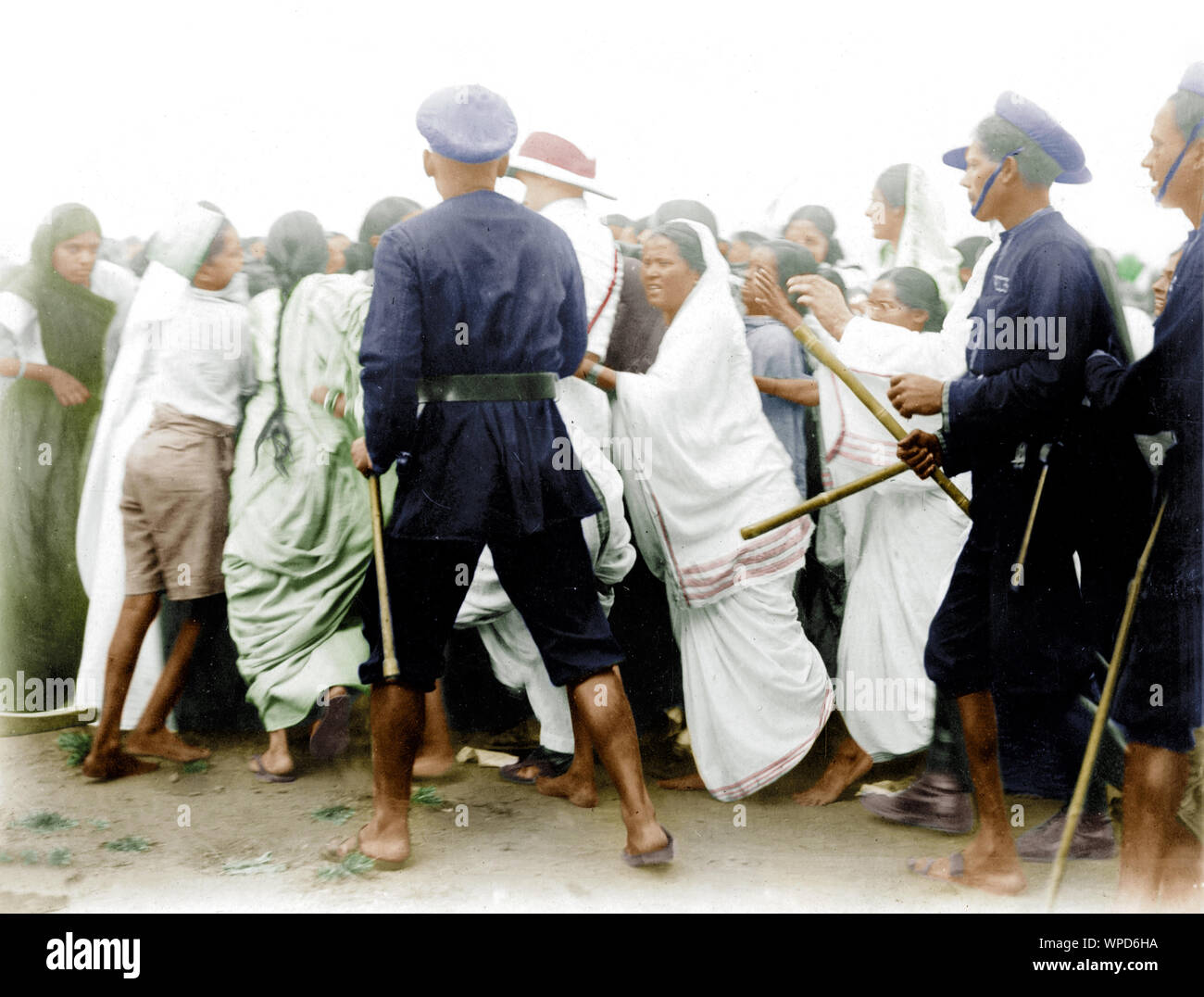 Policemen controlling demonstrators during the Salt Satyagraha, Bombay, India, 1930, old vintage 1900s picture Stock Photo