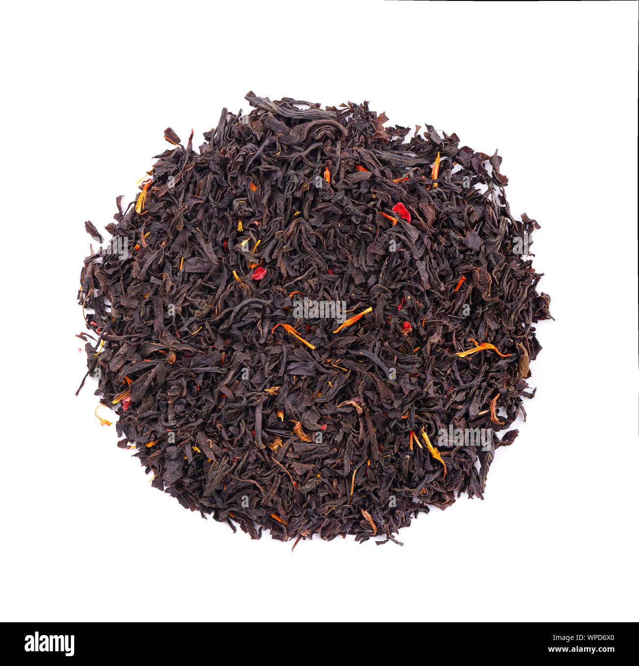 Black Ceylon tea with flower petals and bergamot, isolated on white