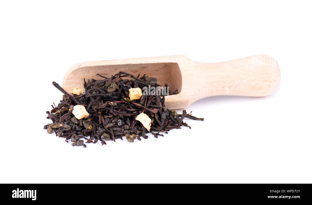 Black and green Ceylon tea with apple and bergamot, isolated on white
