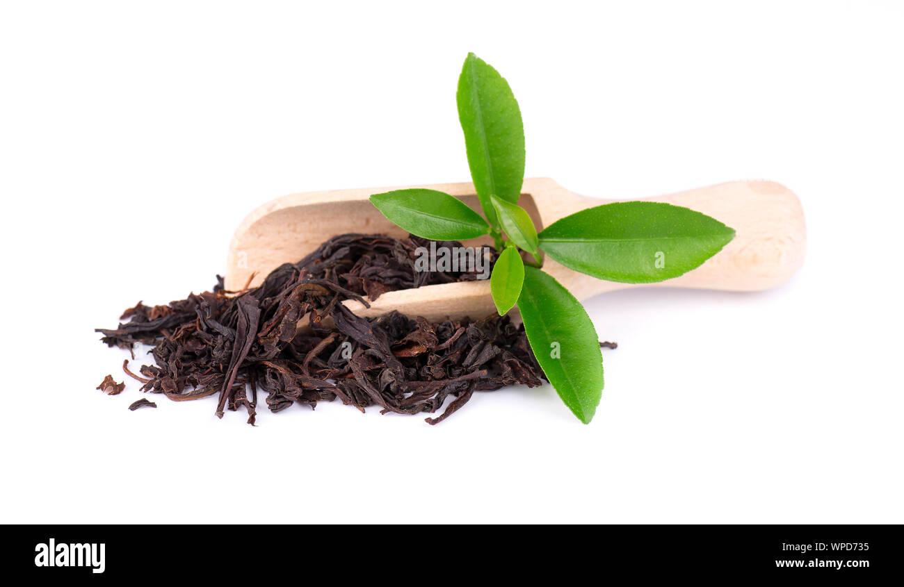 Black Ceylon tea with flower petals and bergamot, isolated on white