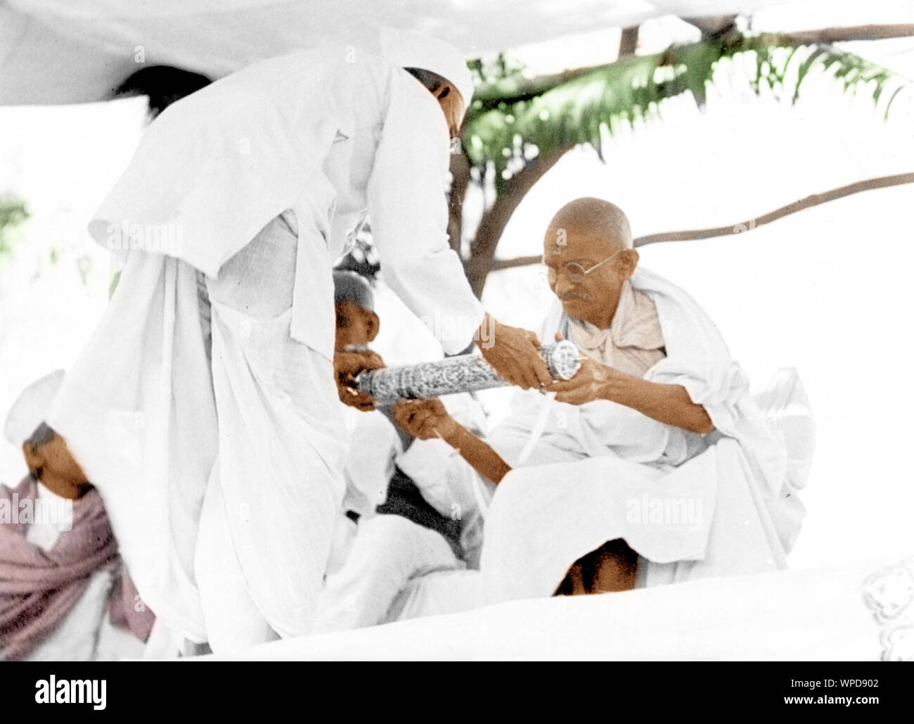 Mahatma Gandhi receiving silver casket on second day of Harijan tour, Nagpur, India, Asia, November 8, 1933 Stock Photo