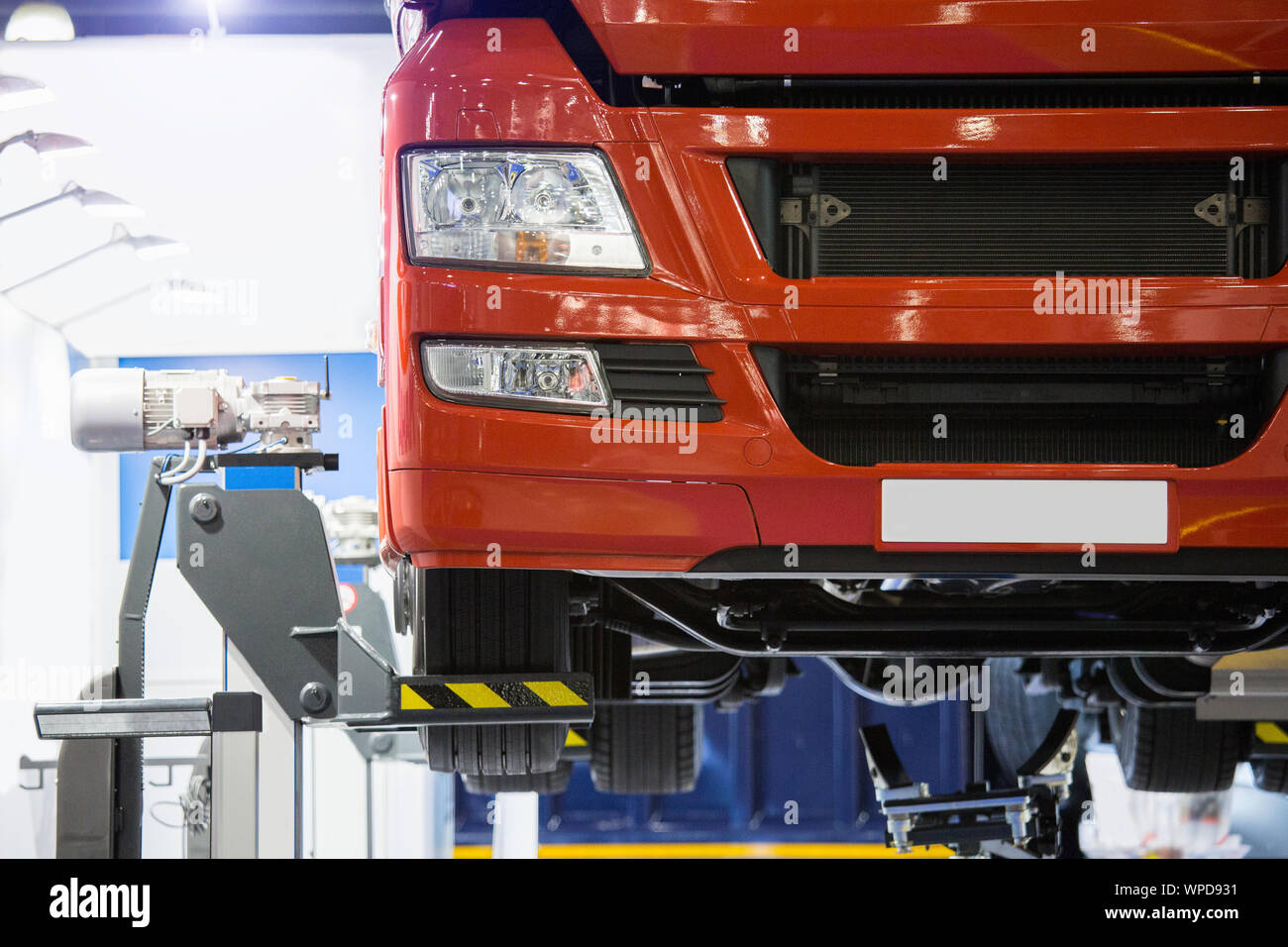 Truck on a lift in a car service Stock Photo - Alamy
