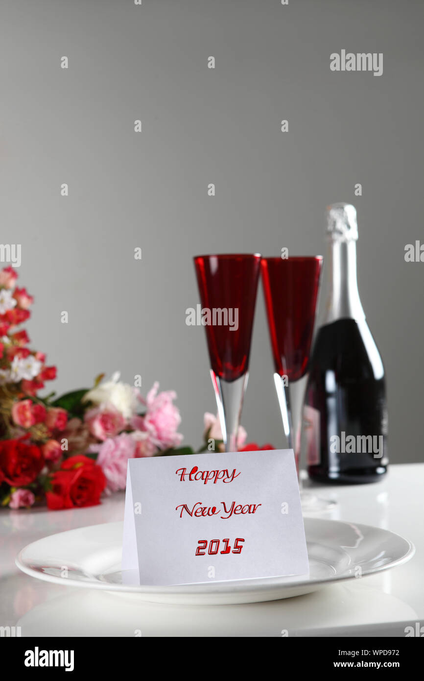 Close up of new year greeting card in a plate Stock Photo