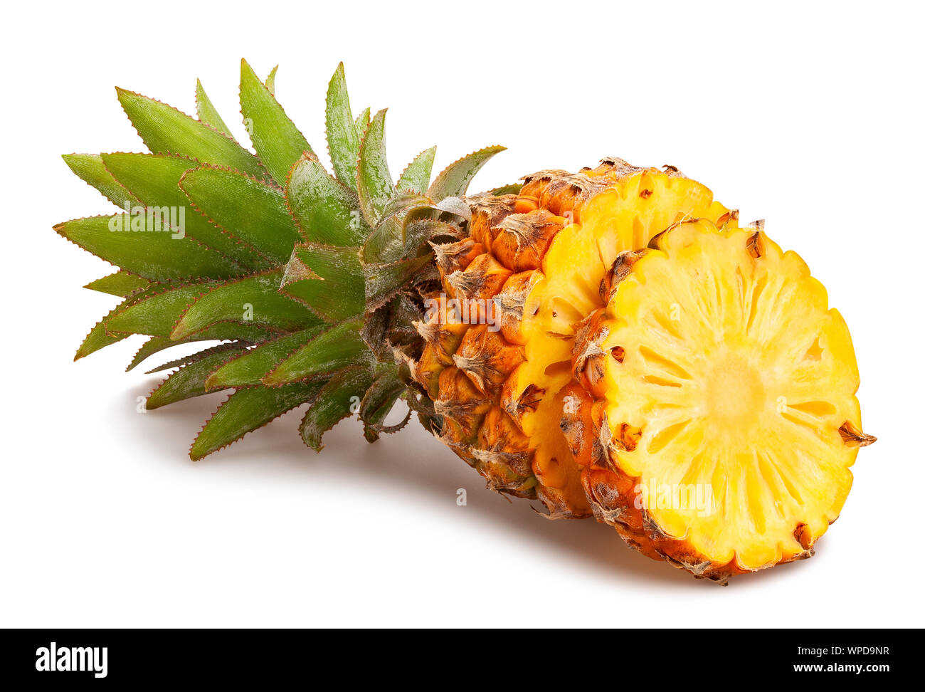 sliced mini pineapple path isolated on white Stock Photo