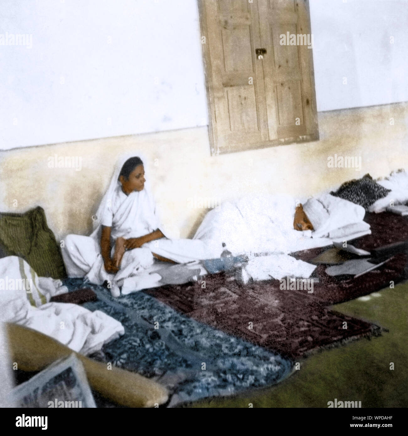 Amtus Salam massaging feet of Mahatma Gandhi, India, Asia, October 1938 Stock Photo