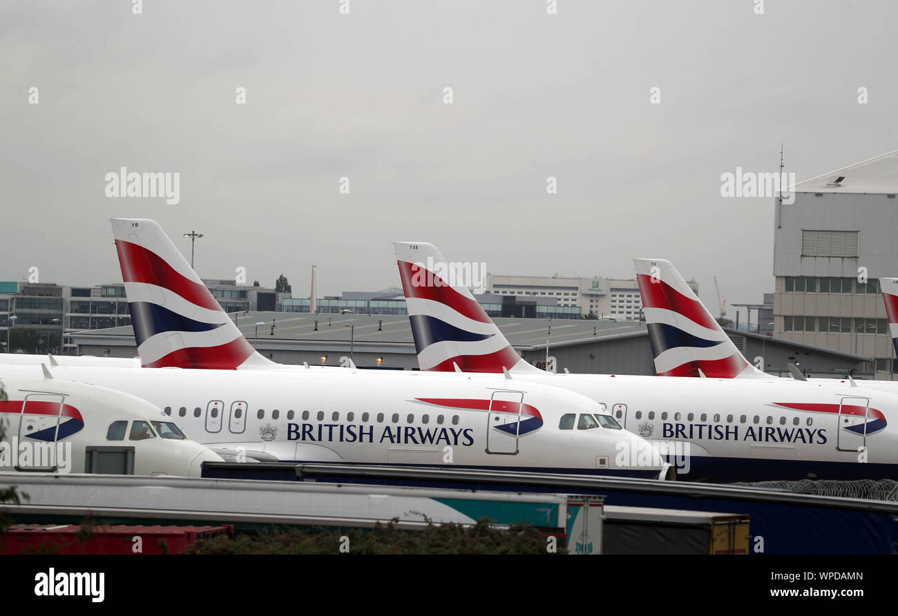 British Airways planes parked at the Engineering Base at Heathrow Airport on day one of the first-ever strike by British Airways pilots. The 48 hour walk out, in a long-running dispute over pay, will cripple flights from Monday, causing travel disruption for tens of thousands of passengers. Stock Photo