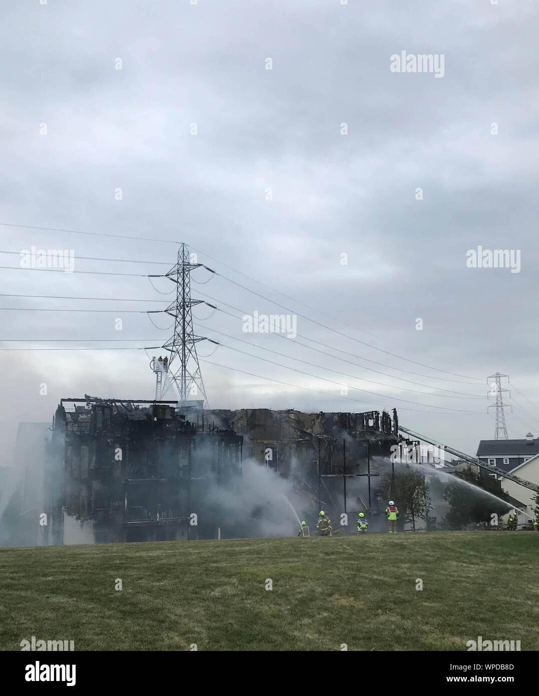 Firefighters at the scene of a fire at a fourstorey block of flats in Sherbrooke Way, Worcester