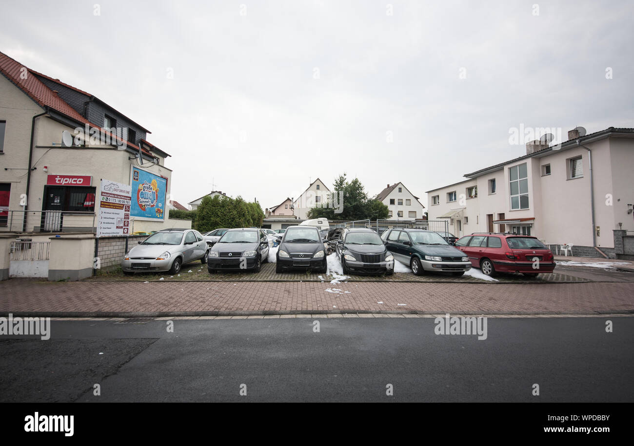 Erlensee, Germany. 09th Sep, 2019. Used cars are parked on the dealer's premises after extinguishing work in foam. The used car dealer in the Main-Kinzig district reported that new vehicles were damaged by fire. The police consider arson to be 'not excluded' and estimate the damage at around 40,000 euros. Credit: Andreas Arnold/dpa/Alamy Live News Stock Photo