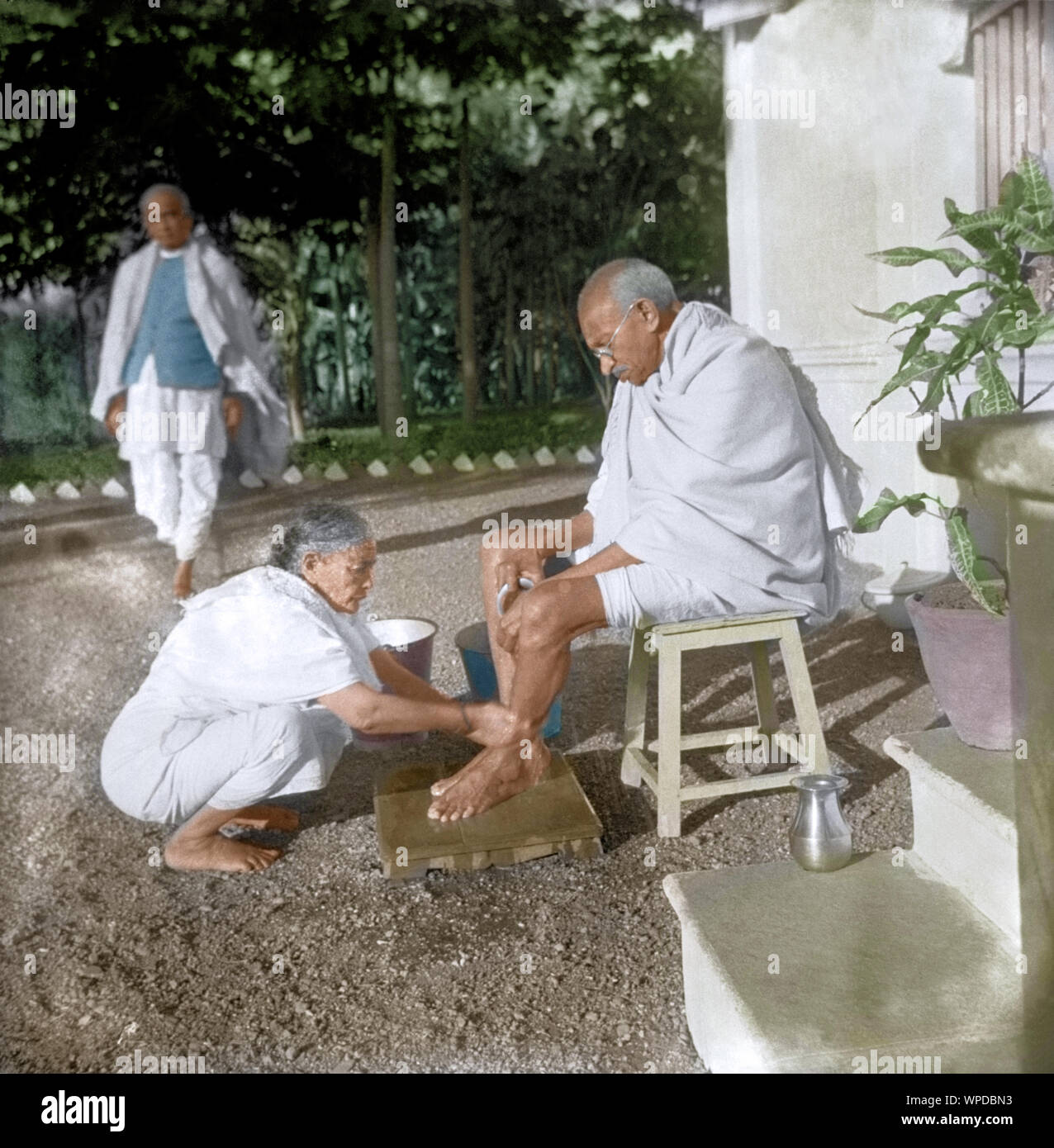 Kasturba Gandhi washing Mahatma Gandhi feet at Surat, India, Asia, January 23, 1939 Stock Photo