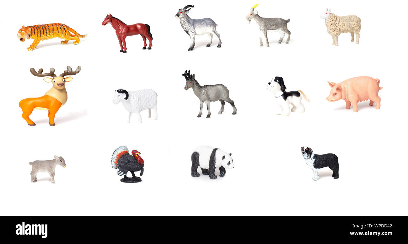 Set of toy wild and domestic animals for children to play, white background, isolate, collection Stock Photo