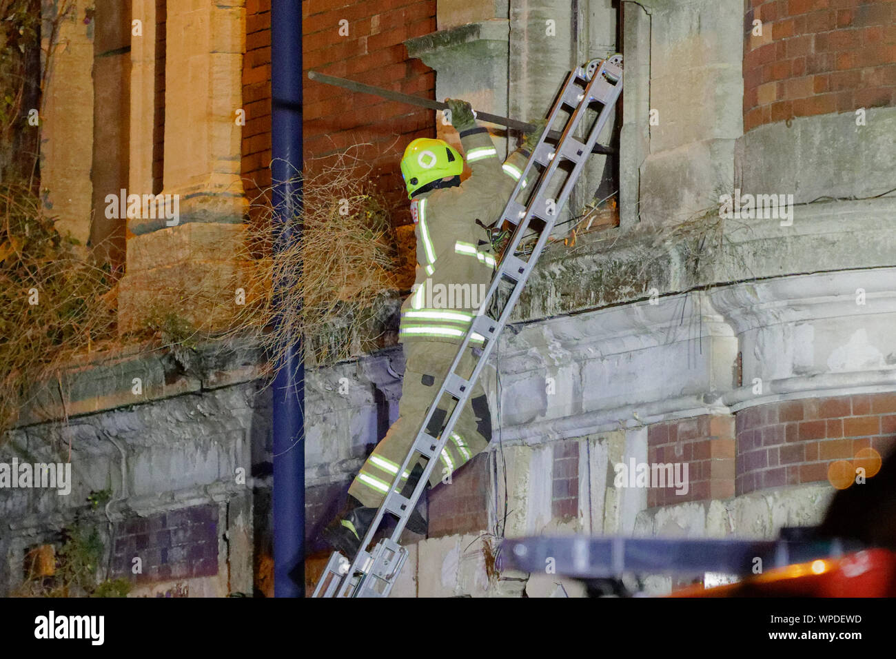 Swansea, UK. 08th Sep, 2019. Pictured: Fire service personnel at the scene. Sunday 08 September 2019 Re: Fire service and police attend a fire at the Palace Theatre, a dilapidated building in the High Street of Swansea, Wales, UK. Credit: ATHENA PICTURE AGENCY LTD/Alamy Live News Stock Photo