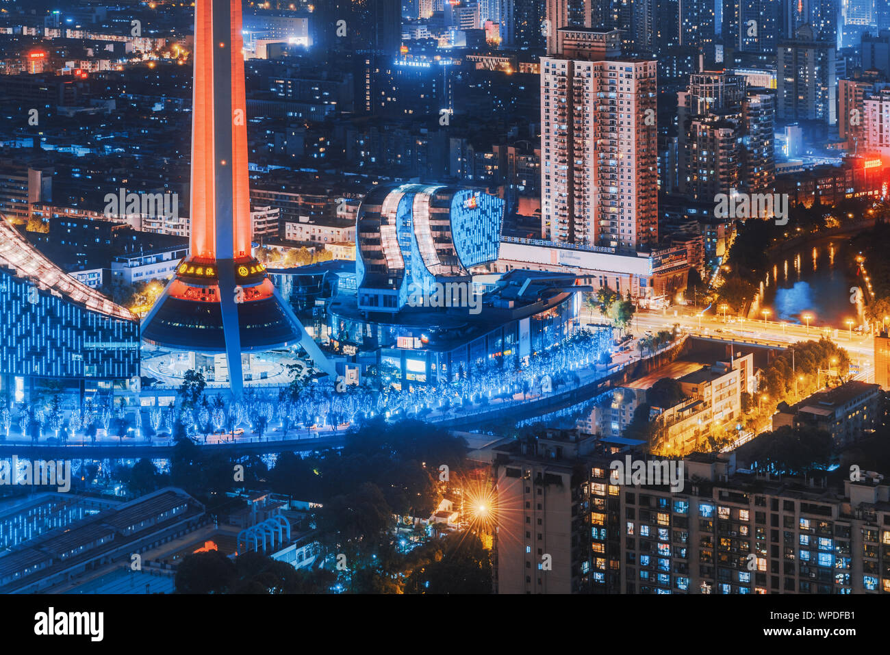 Chengdu, Sichuan province, China - May 16, 2016 : Sichuan TV tower and 339 building illuminated at night aerial view Stock Photo
