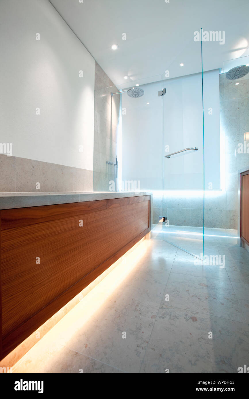 Modern bathroom with shower and bathtube. Stock Photo