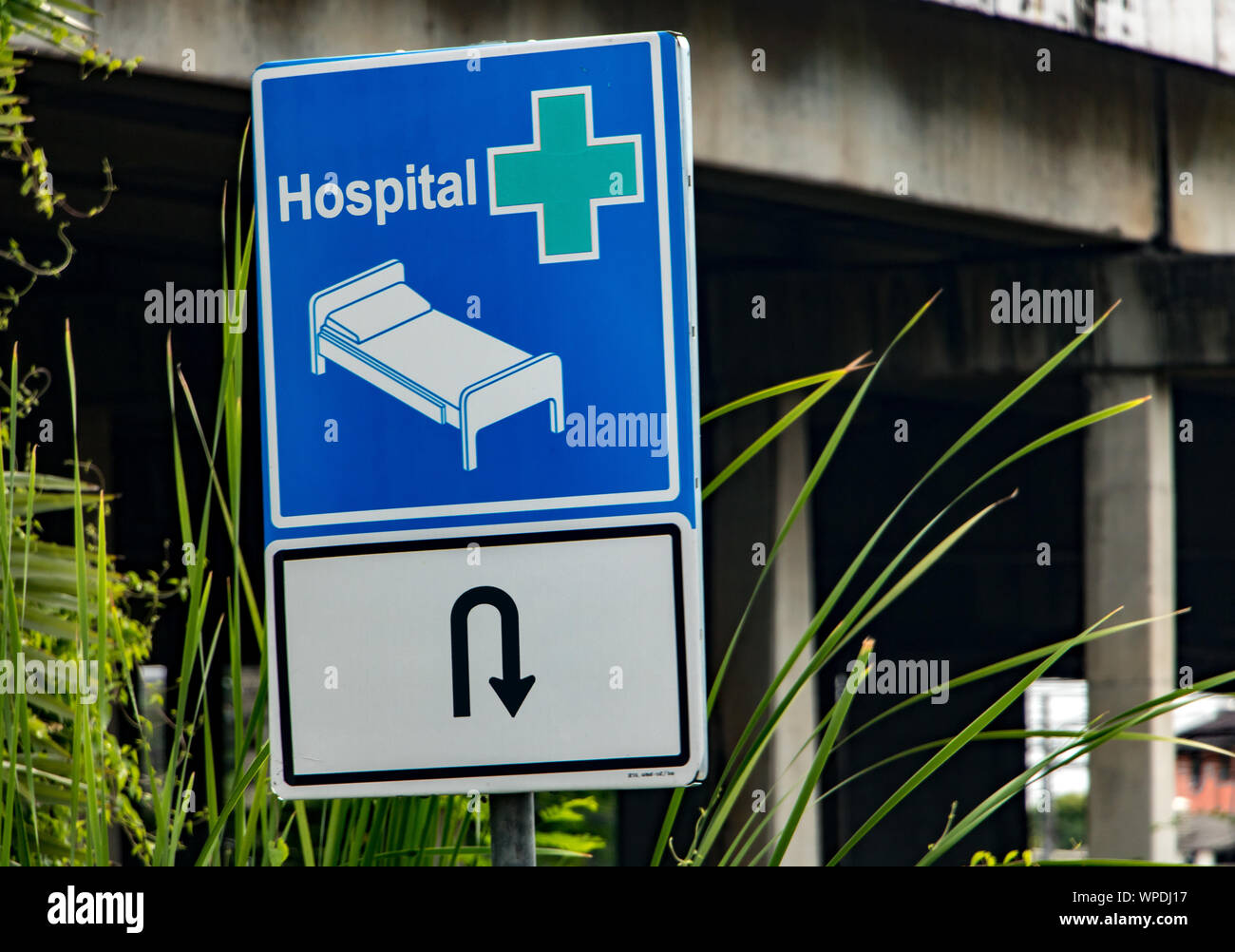 Information sign on the direction of the road to the hospital. Stock Photo