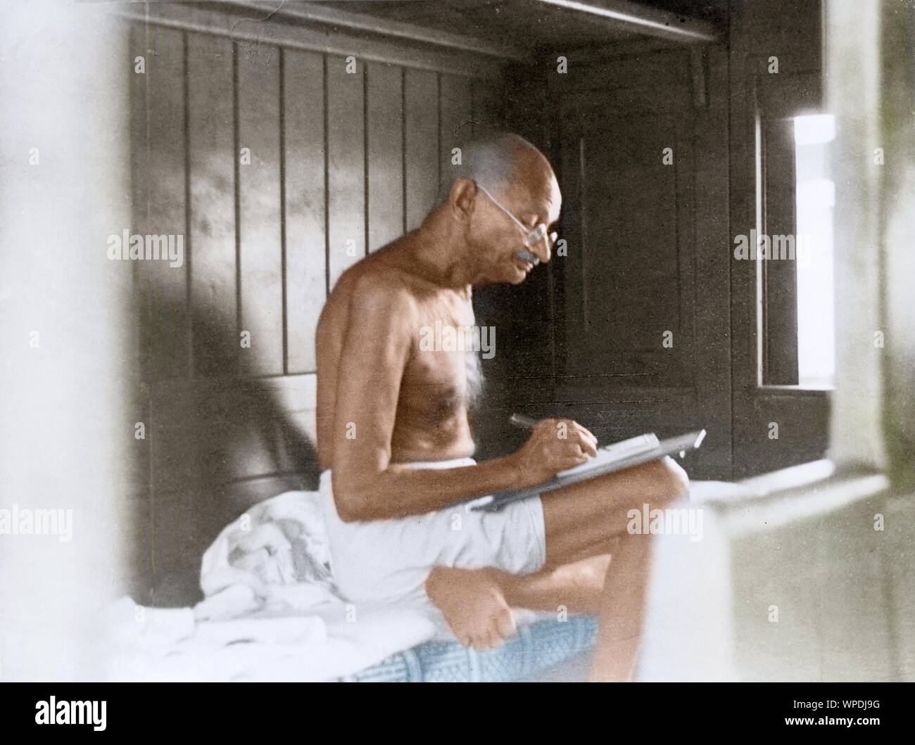 Mahatma Gandhi writing in train on way to Shimla, India, Asia, June 24, 1945 Stock Photo
