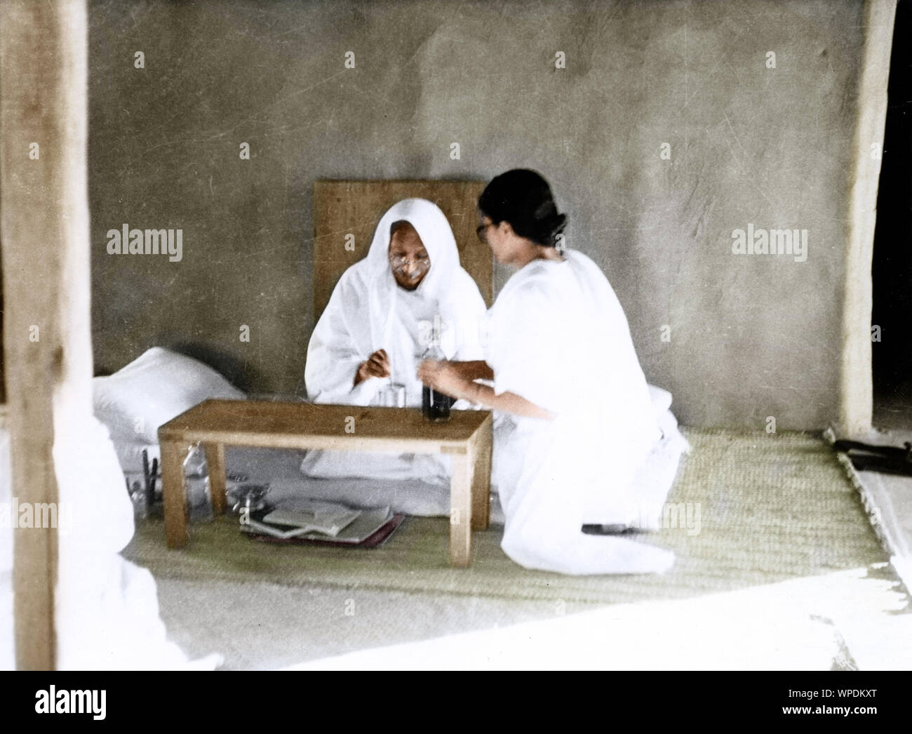 Abha Gandhi attending to Mahatma Gandhi, India, Asia, 1945 Stock Photo