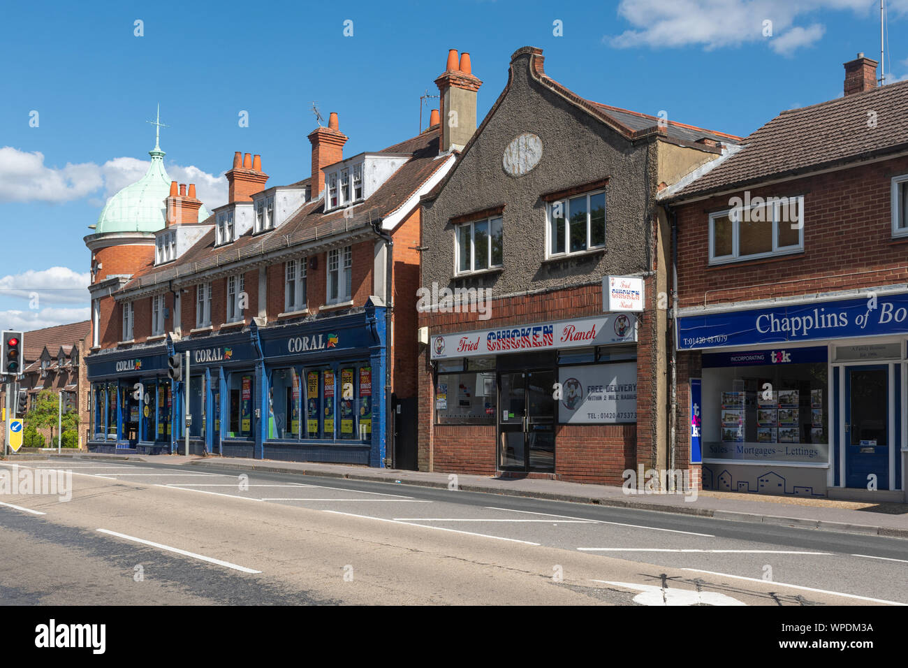 High Street shops and businesses in the town of Bordon, Hampshire, UK Stock Photo