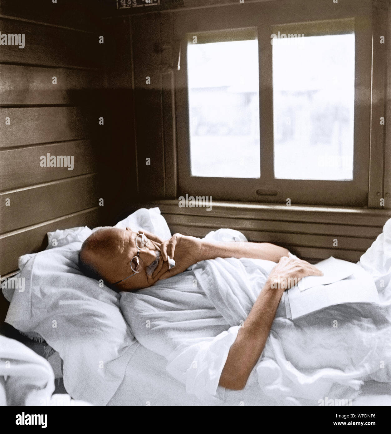 Mahatma Gandhi sleeping in train compartment, India, Asia, May 1946 Stock Photo